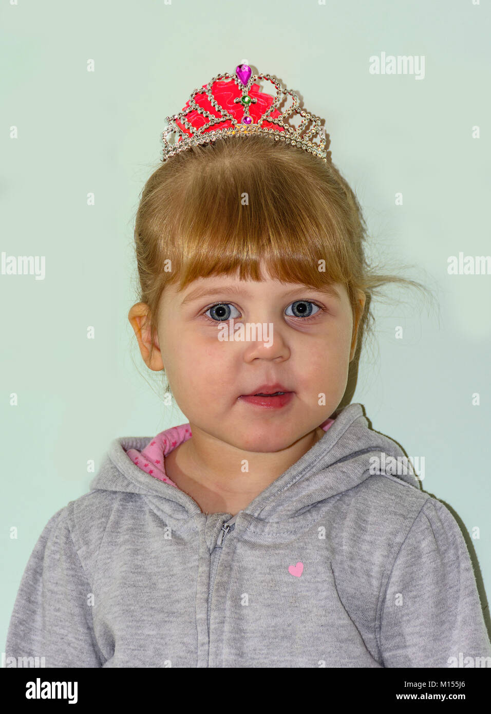 The little blonde girl with blue eyes Stock Photo - Alamy