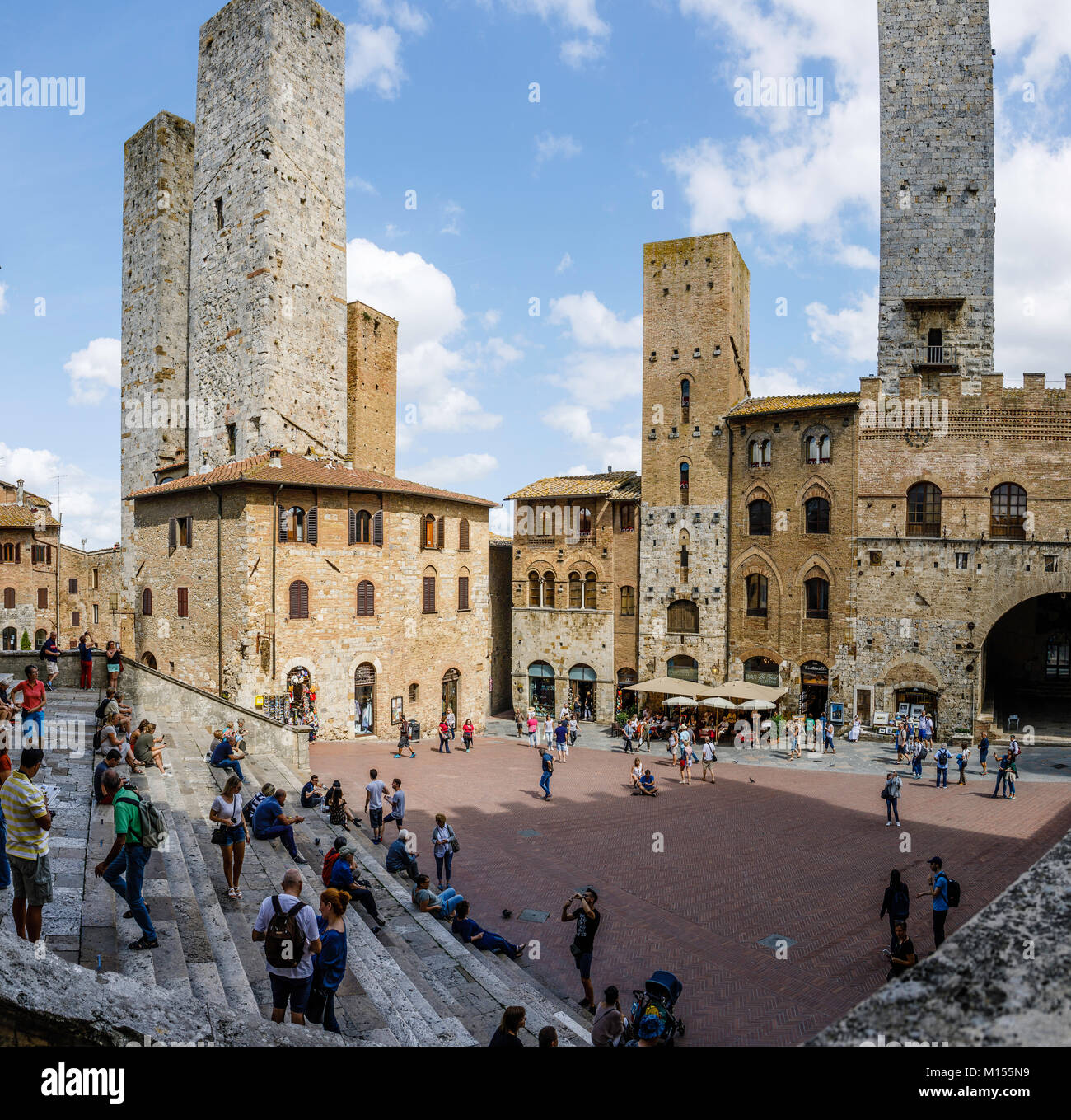 San Gimignano is a small walled medieval hill town known as the Town of Fine Towers. San Gimignano is famous for its medieval architecture. Stock Photo