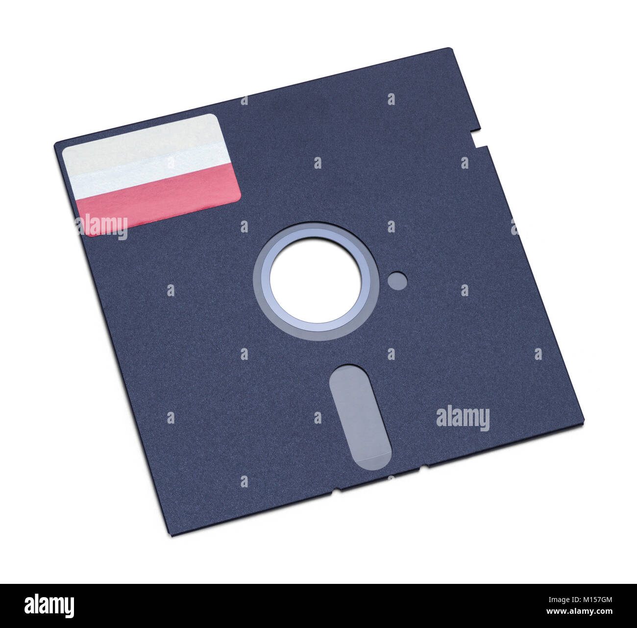 Old Vintage Computer Floppy Disc Isolated on White Background. Stock Photo