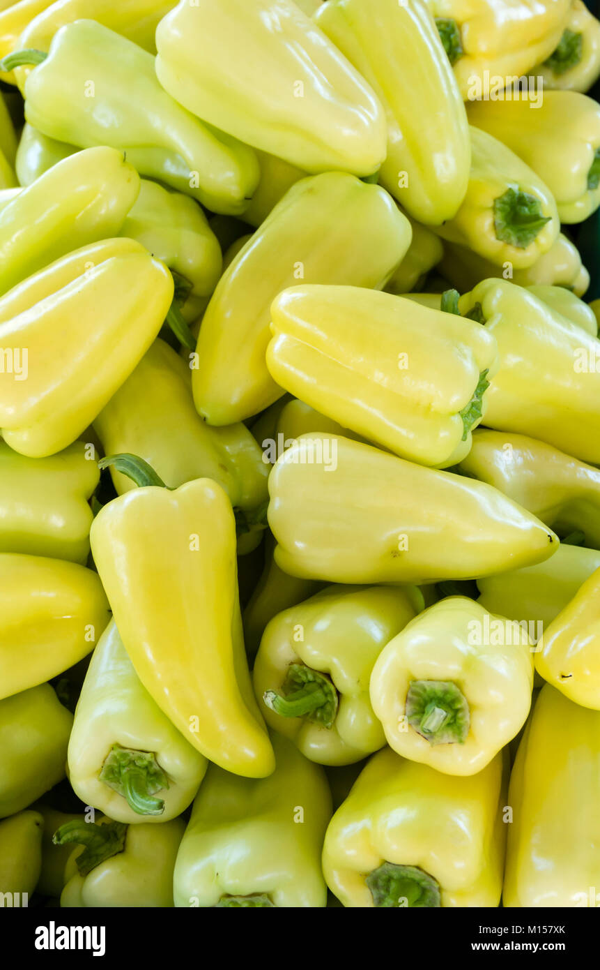 Fresh yellow peppers for sale at the farmers market Stock Photo