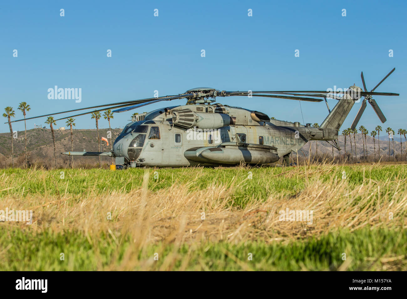 A Sikorsky CH-53E Super Stallion assigned with Marine Heavy Helicopter Squadron 361 wait for training to start for the day aboard Camp Pendleton, Calif. January 26, 2018. HMH-361 continuously conducts training exercises to prepare for future deployments and maintain mission readiness. (U.S. Marine Corps photo by Lance Cpl. Dalton S. Swanbeck) Stock Photo