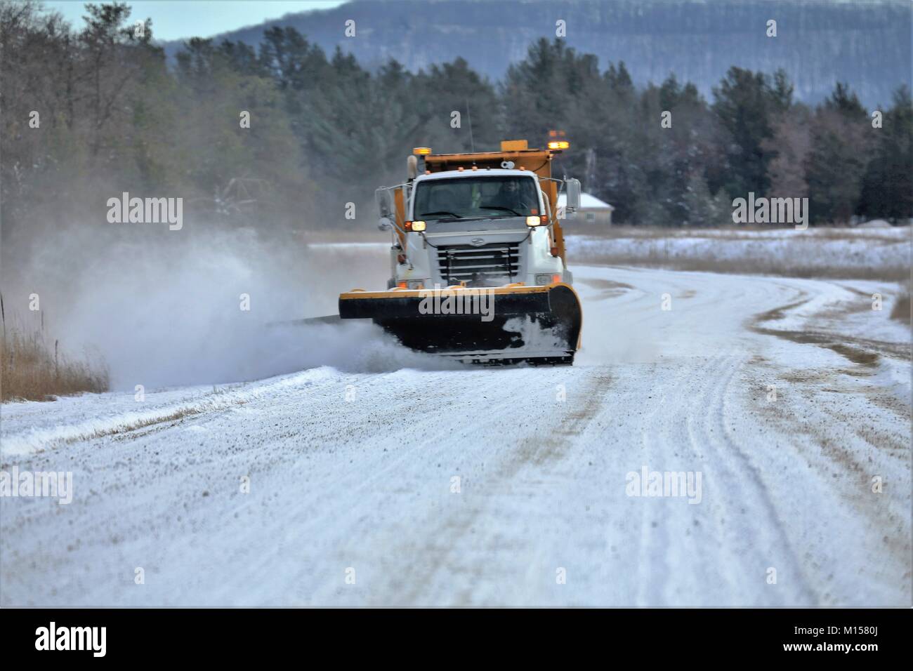 An equipment operator with the Fort McCoy snow removal contractor