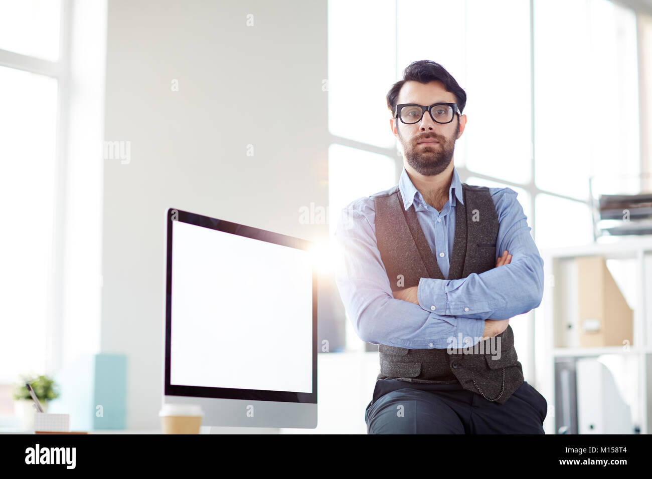 Confident employee hi-res stock photography and images - Alamy