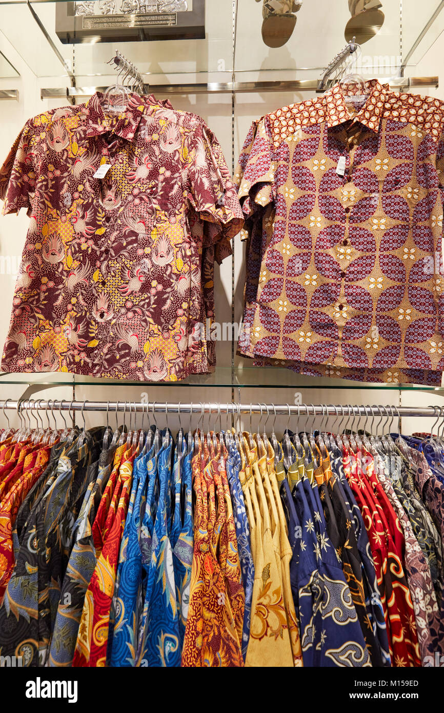 A selection of Indonesian batik shirts in a shop on Malioboro street. Yogyakarta, Java, Indonesia. Stock Photo