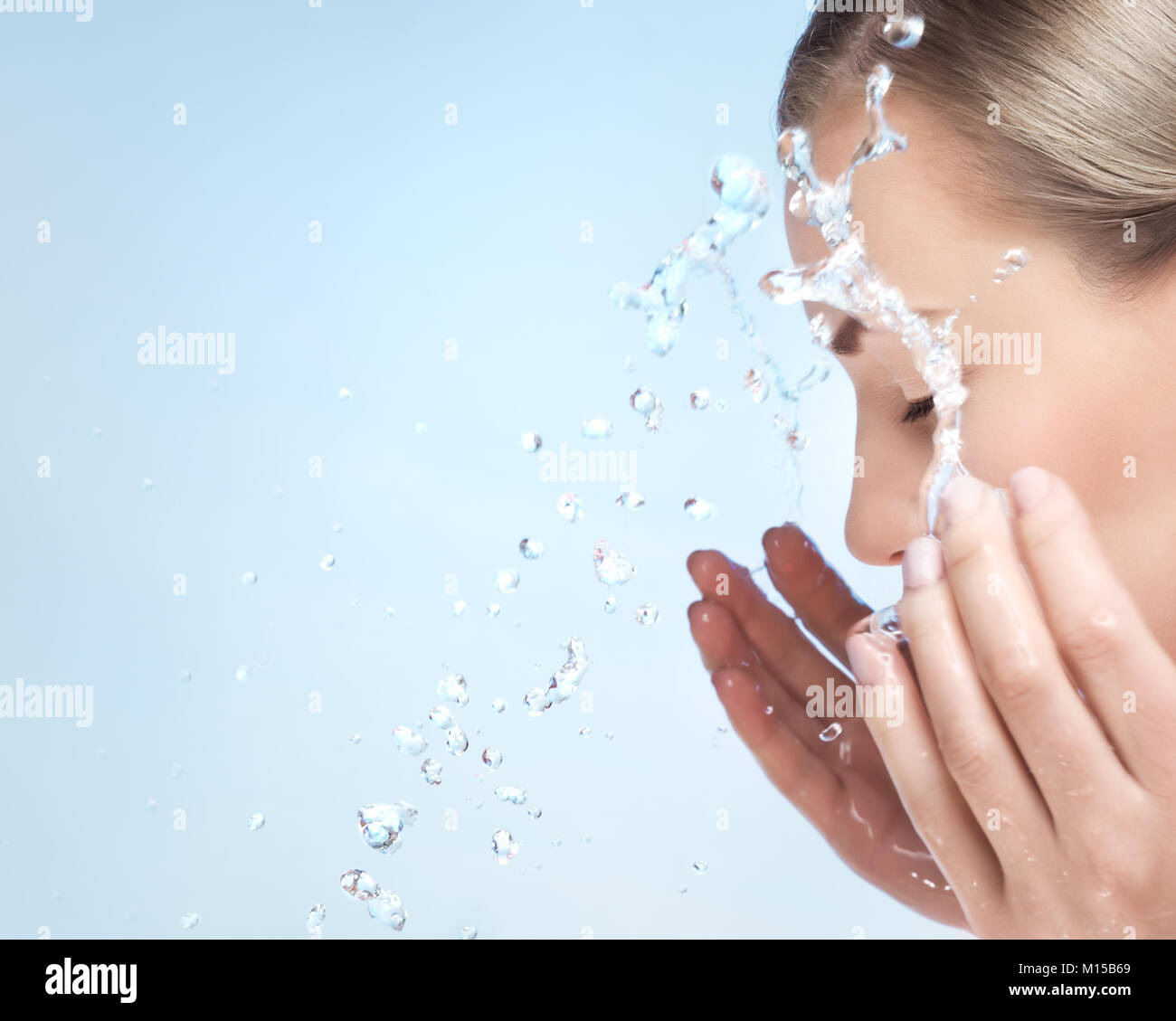 washing face with water