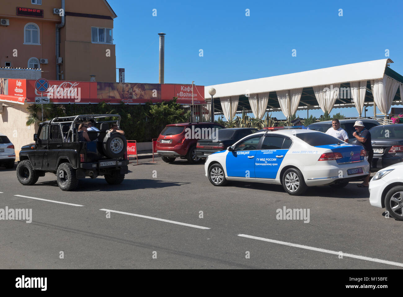 Adler, Sochi, Krasnodar region, Russia - July 13, 2016: Police stopped an open a UAZ car with passengers on the streets of settlement Adrer, Sochi Stock Photo