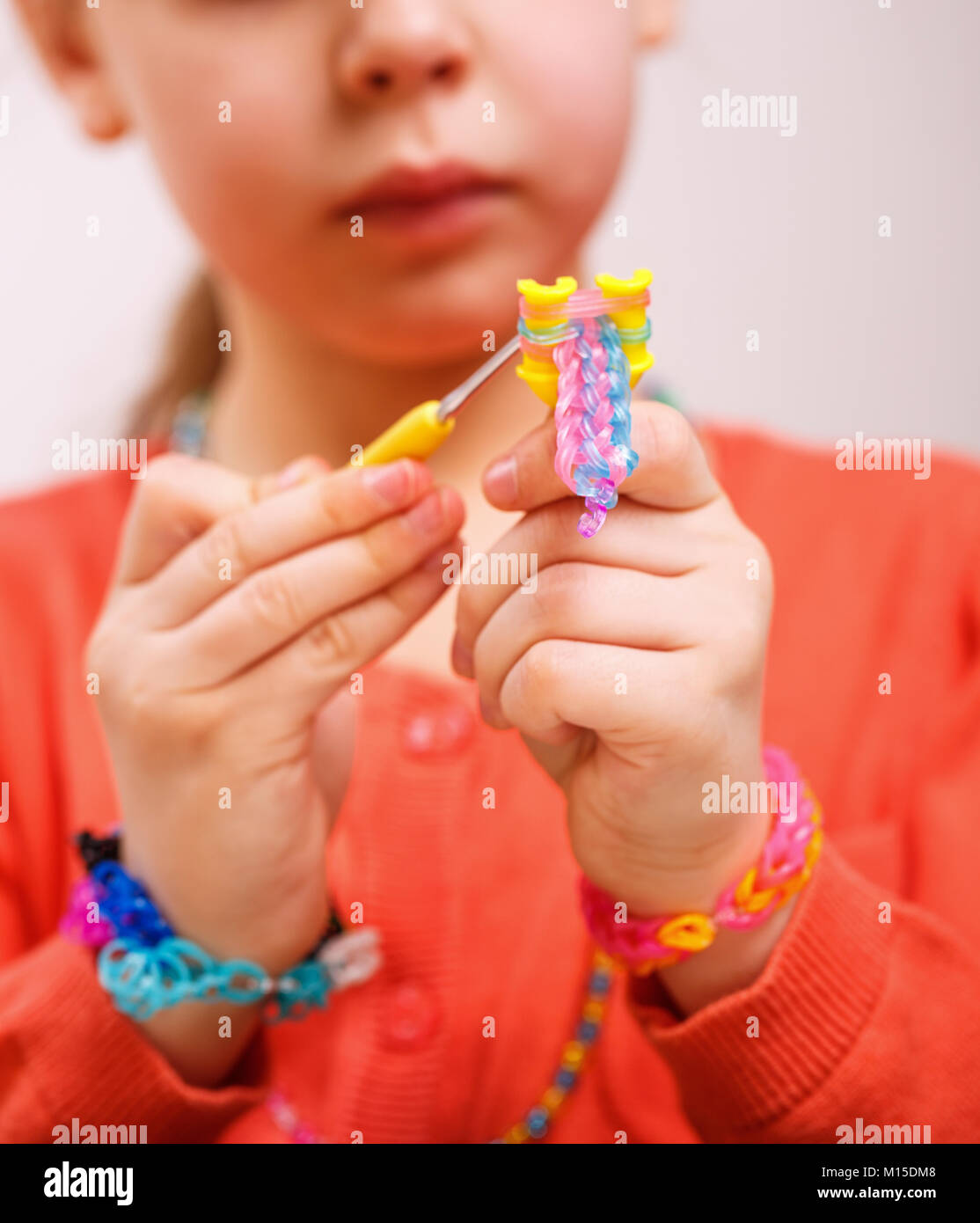Colorful Rainbow loom bracelet rubber bands in a box Stock Photo