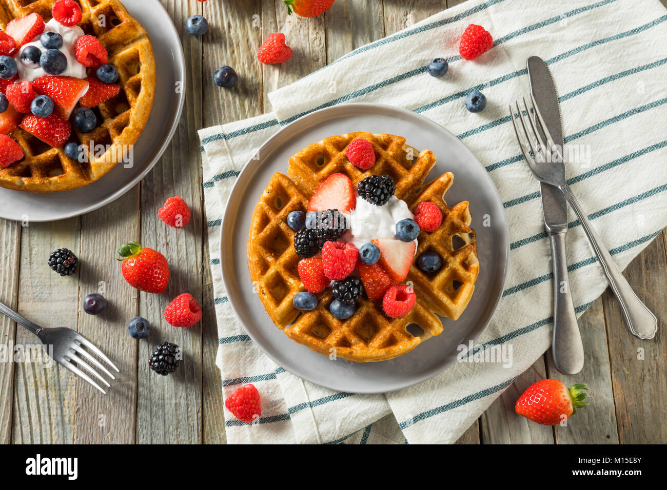 Sweet Homemade Berry Belgian Waffle with Whipped Cream Stock Photo