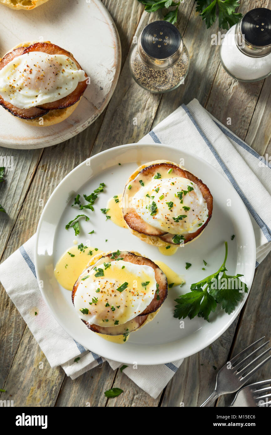 Homemade Eggs Benedict with Bacon and Hollandaise Sauce Stock Photo Alamy