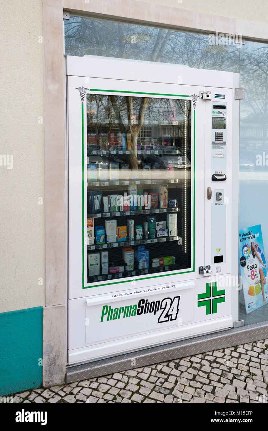 PharmaShop 24 vending machine in the street offering 24 hour a day medicine and pharmacy products. Stock Photo