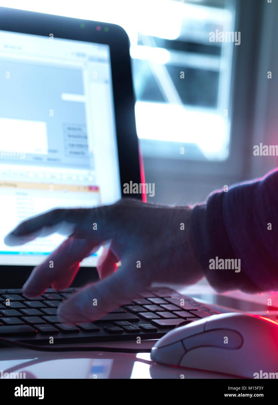MODEL RELEASED. Computer hacking, conceptual image. Stock Photo