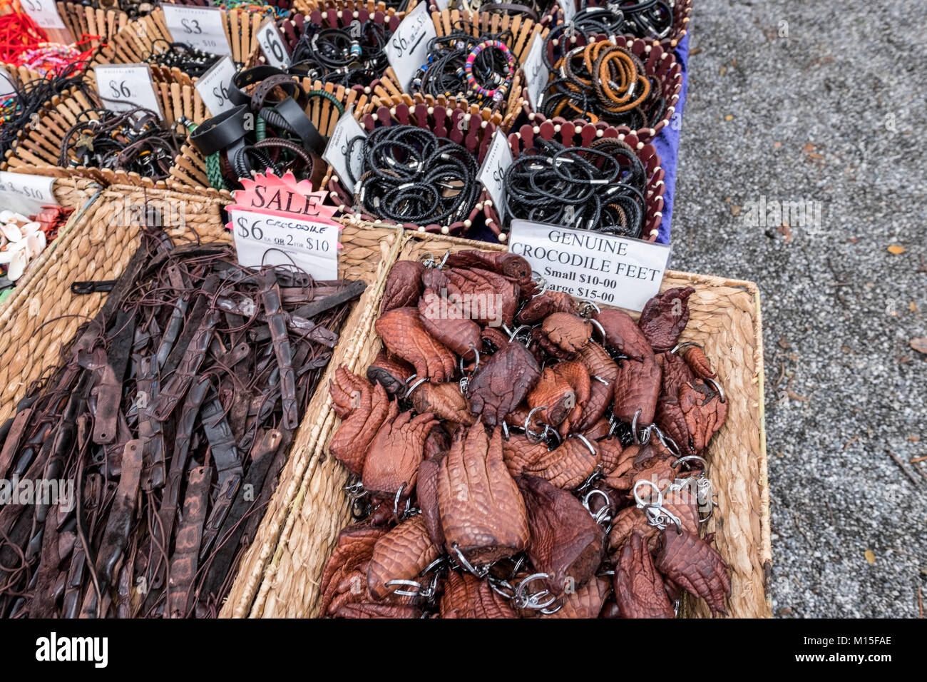 Crocodile feet and leather bracelets on sale at Port Douglas sunday markets,Far north Queensland,Australia Stock Photo