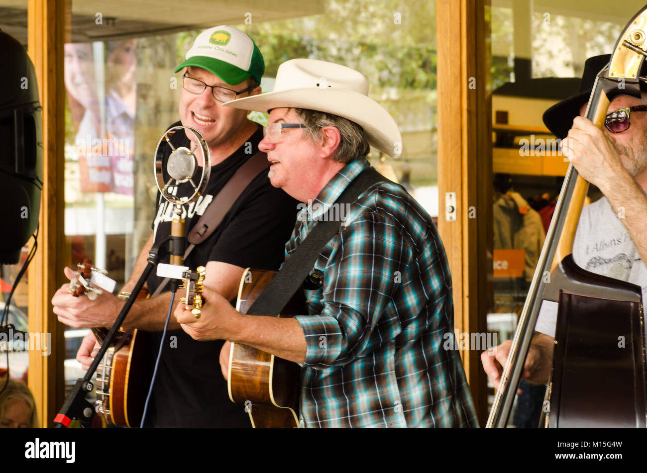 Two buskers singing into a microphone at 46th annual Country Music Festival, Tamworth Australia. Stock Photo