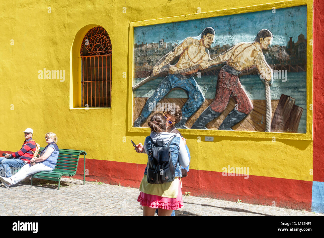 Buenos Aires Argentina,Caminito Barrio de la Boca,street museum,immigrant neighborhood,brightly painted buildings,sculpture,relief,adult adults man me Stock Photo