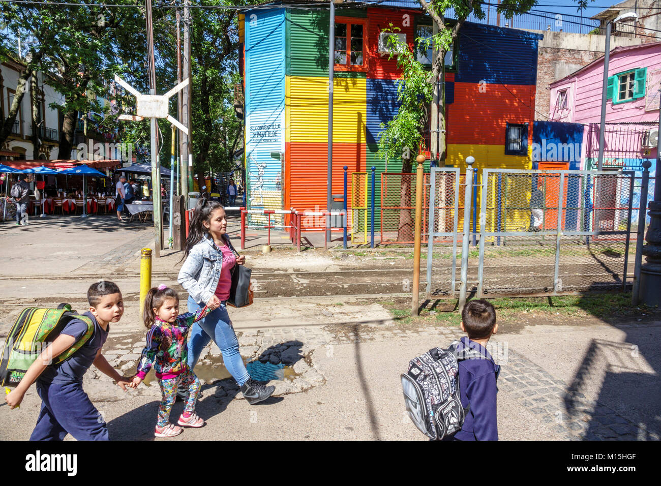 Buenos Aires Argentina,Caminito Barrio de la Boca,street museum,immigrant neighborhood,brightly painted buildings,adult adults woman women female lady Stock Photo