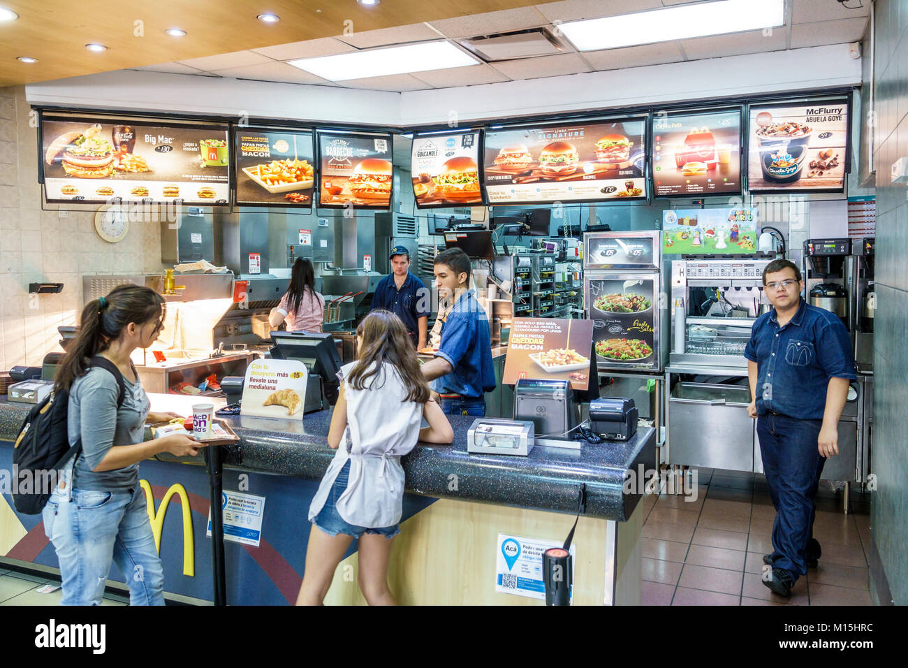 Buenos Aires Argentina,McDonald's,fast food,restaurant restaurants dining eating out cafe cafes bistro,hamburgers,counter,adult adults man men male,wo Stock Photo