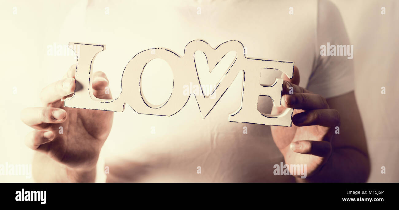 People holding word hands letters hi-res stock photography and images ...