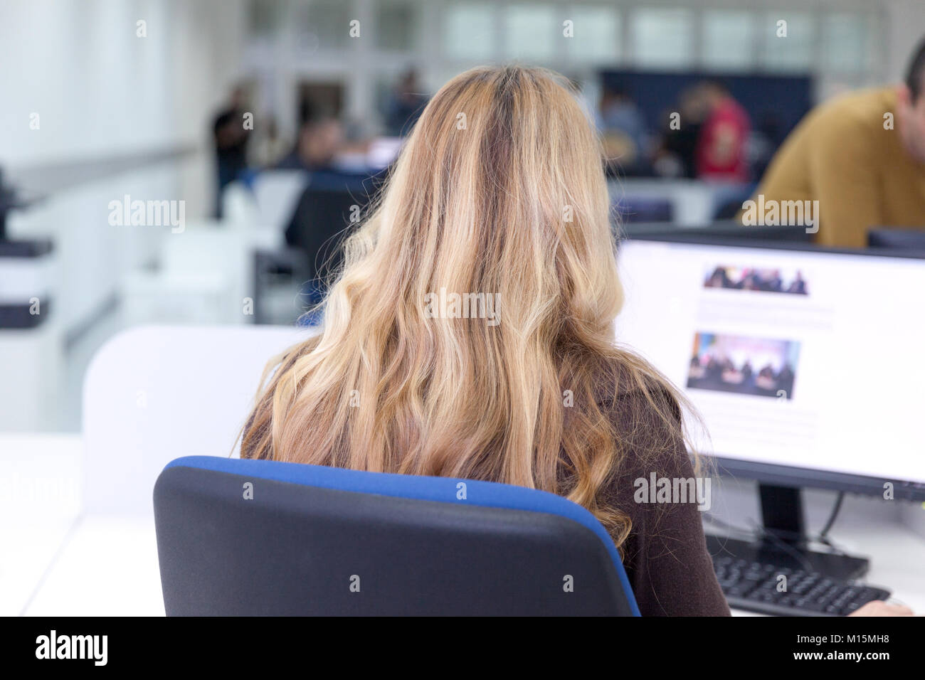 Female computer operator at work Stock Photo - Alamy