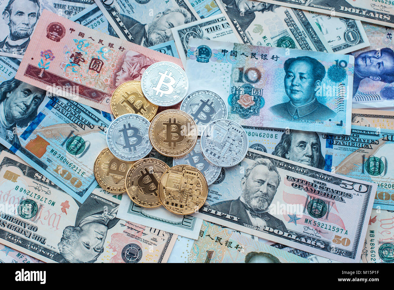 Paper denominations US dollars, Chinese yuan, metal coins bitcoin gold and  silver, money background Stock Photo - Alamy