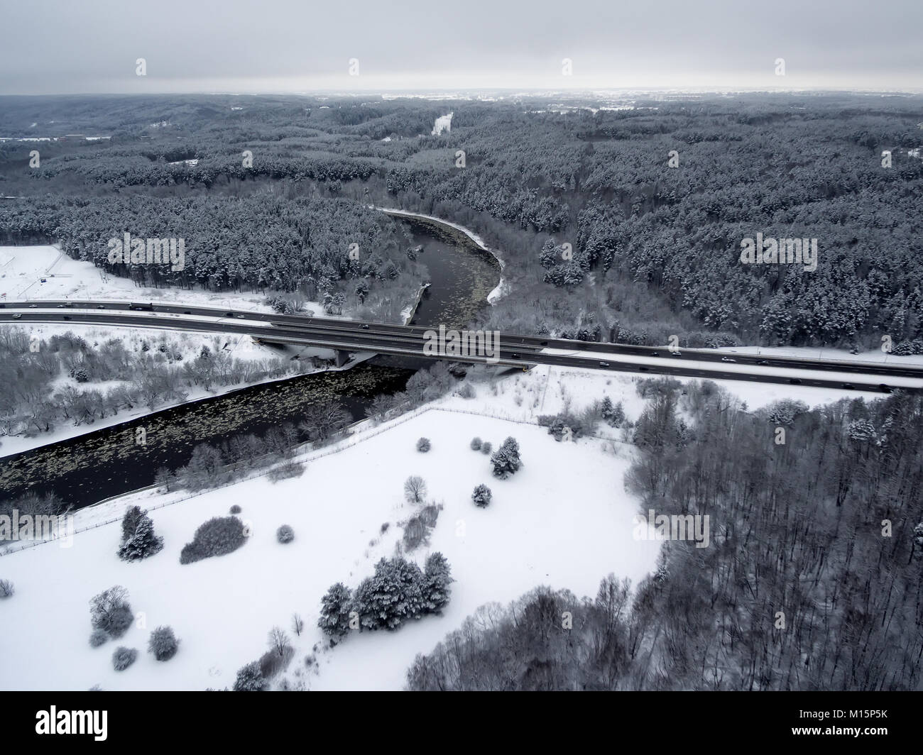 Vilnius, Lithuania: aerial top view of Neris river, surrounding forests and Gariunai road Stock Photo