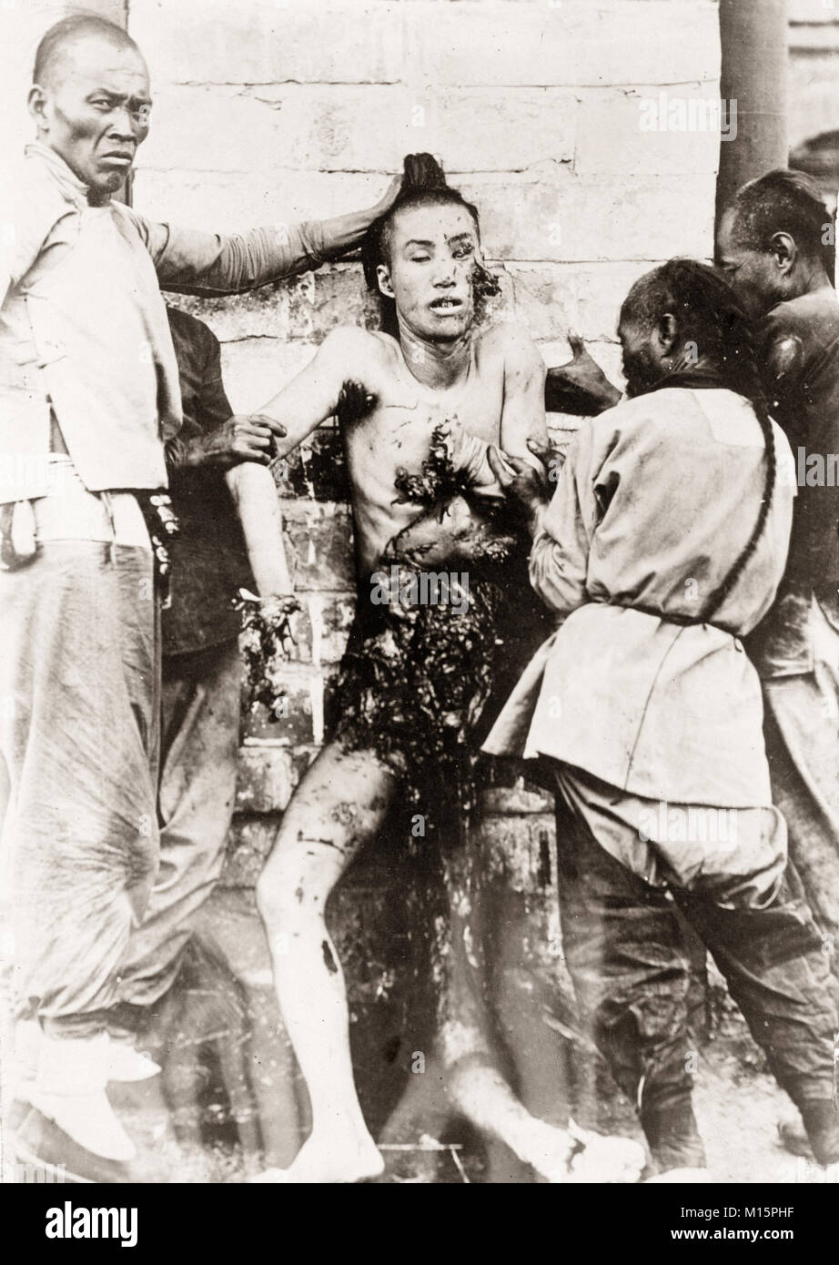 Chinese torture and execution, China c.1890's Lingchi or 'Death by 1000 cuts' which was outlawed in 1905. Stock Photo