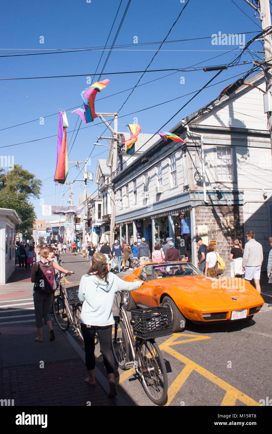 Pedestrians and a Classic Corvette on Commercial Street in Provincetown, Cape Cod, Massachusetts Stock Photo