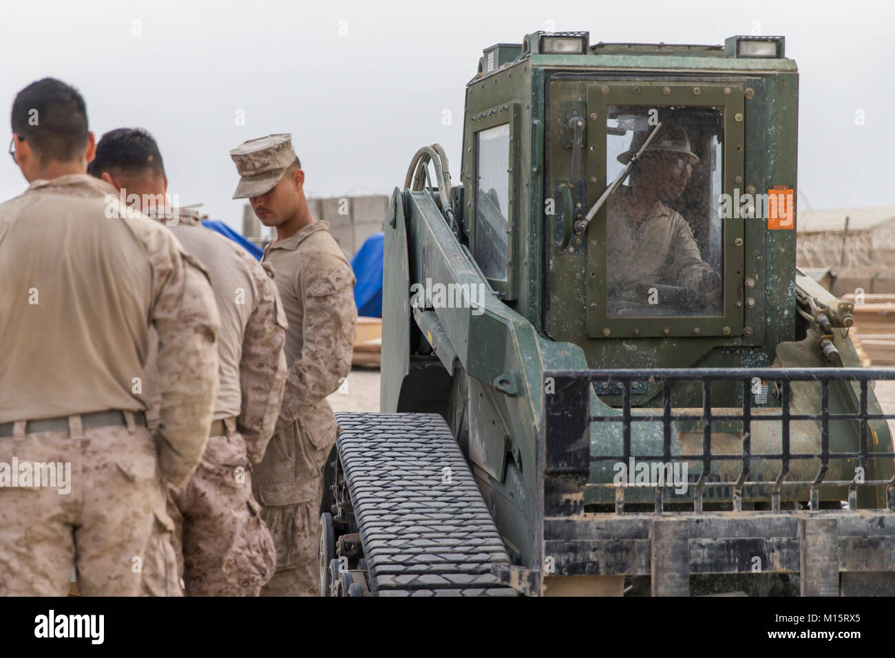 AL TAQADDUM, Iraq U.S. Marine Corps Cpl. Antonio Cisneros, a heavy equipment operator with