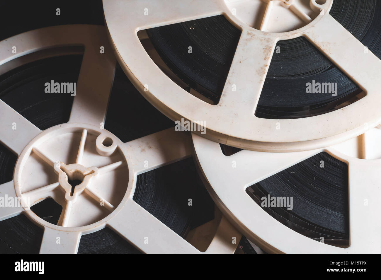 Old 8mm film reels with a film Stock Photo - Alamy