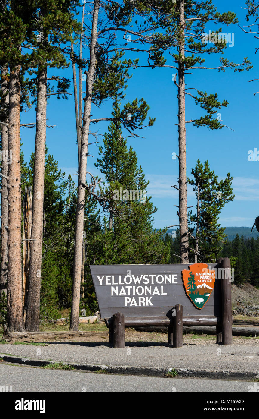 Wooden entrance sign erected by the National Park Service at the south entrance of Yellowstone National Park.  Wyoming Stock Photo