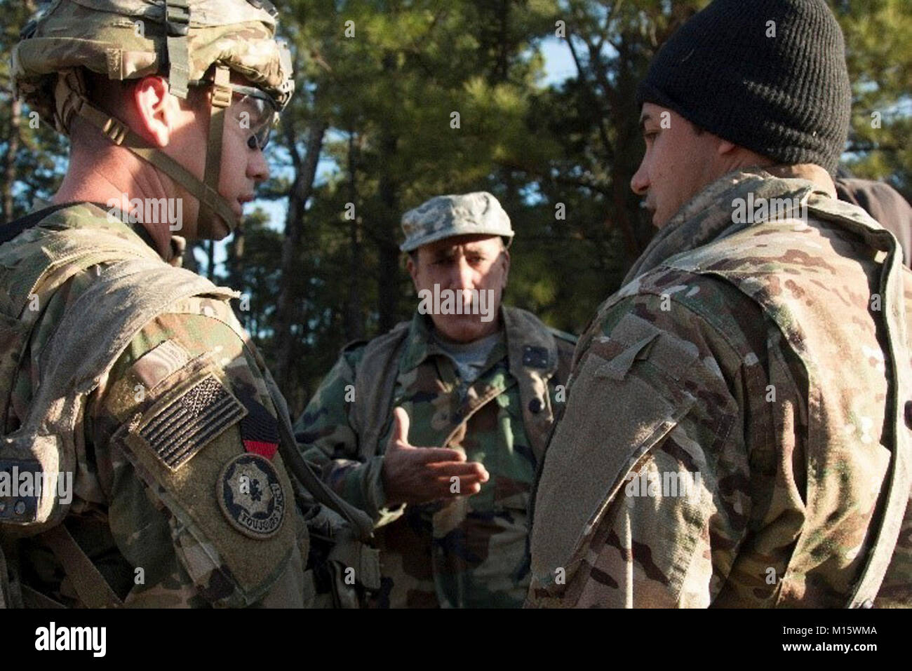 Capt. William Webster, an infantryman assigned to 2nd Battalion, 1st Security Forces Assistance Brigade speaks to a simulated member of the Afghan National Army via a translator during their rotation at the Joint Readiness Training Center, Jan. 23, 2018, at Fort Polk, La. Combat Advisors focus on advising, and enabling foreign partners to increase their readiness and take decisive action. (U.S. Army Stock Photo