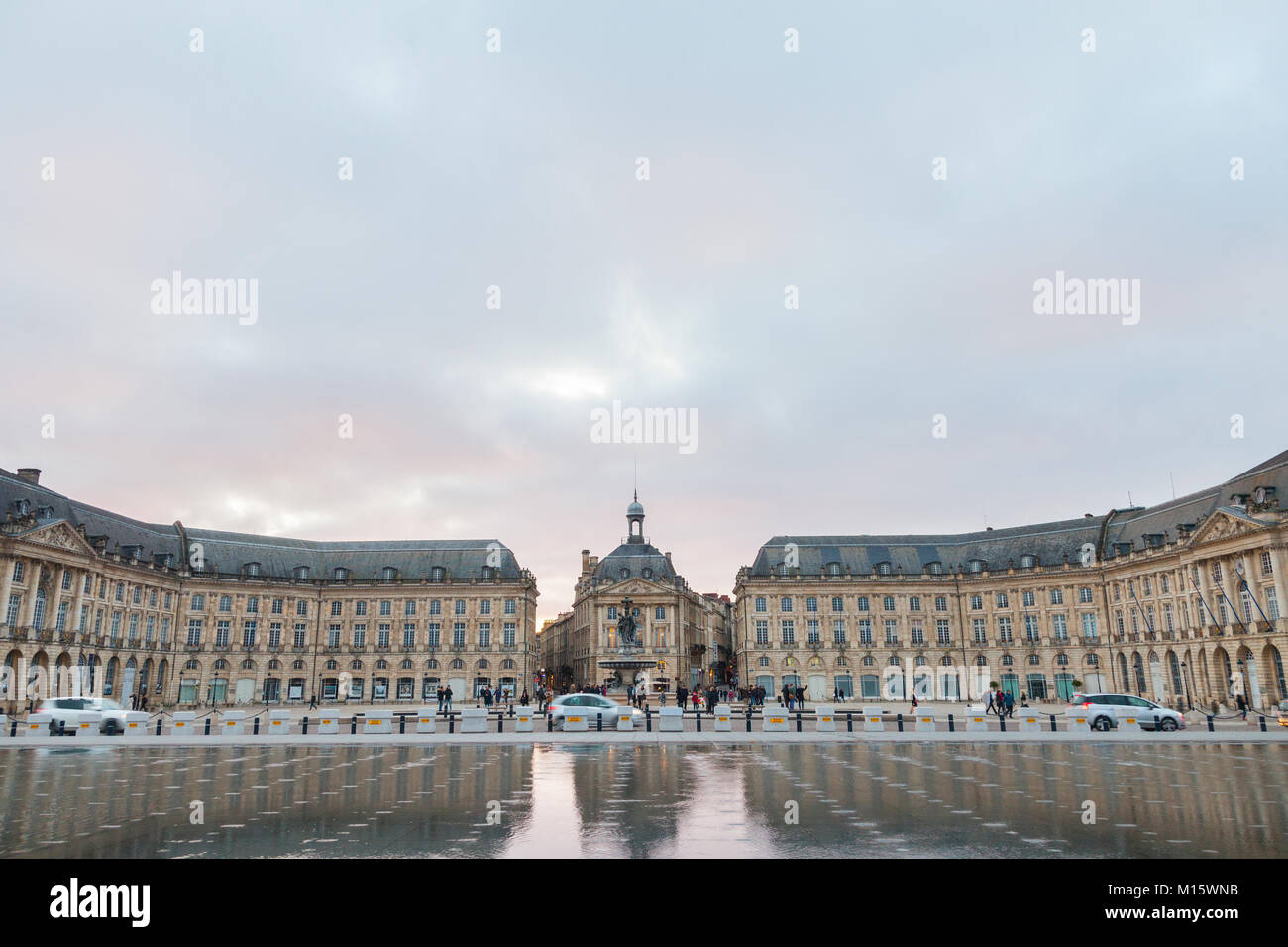 BORDEAUX, FRANCE - DECEMBER 24, 2017: Water Mirror (Miroir d'Eau) fountain on place de la Bourse square. It is one of the symbols of Bordeaux, and the Stock Photo