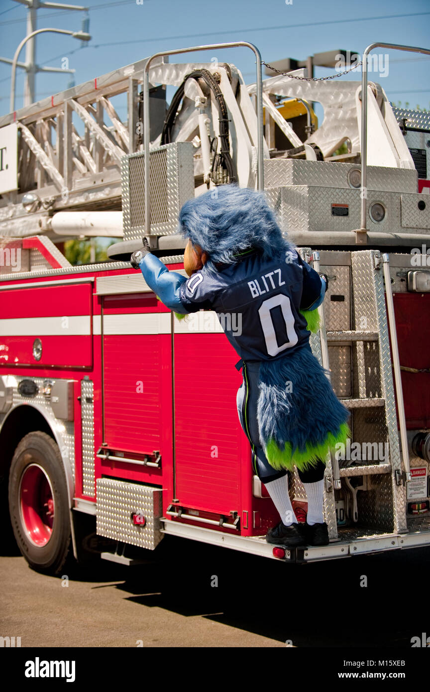 The Seattle Seahawks mascot Blitz standing on a fire truck Stock Photo