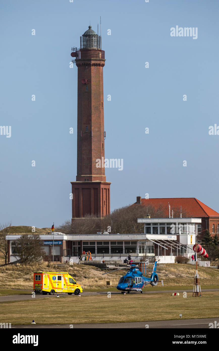 The East Frisian North Sea island Norderney, Germany, winter, lighthouse at the airport, helicopter EC 155, Northern HeliCopter, Emden, transport and  Stock Photo