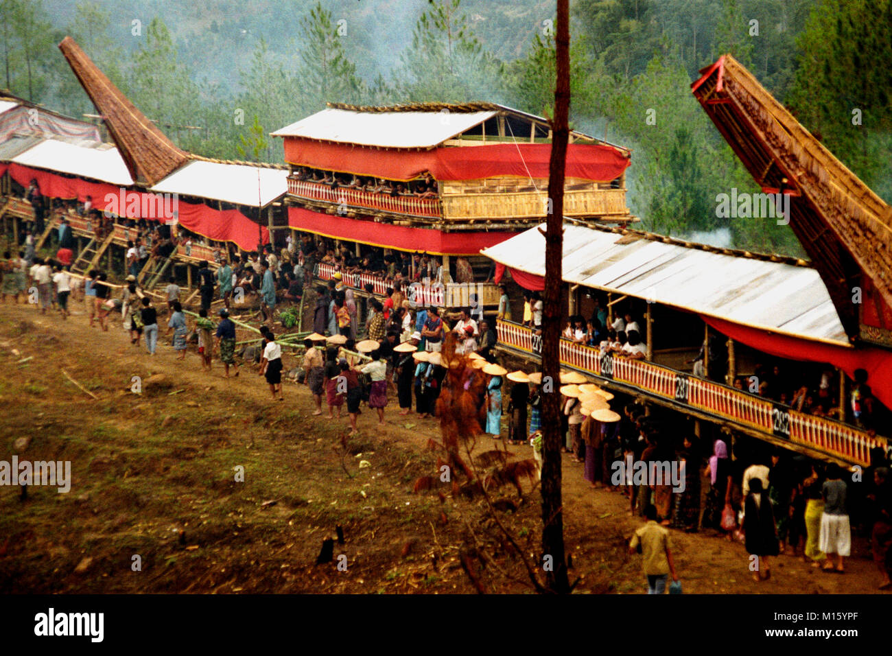 Amongst the Toraja people of South Sulawesi, Indonesia, a funeral is an rite of passage celebrated by thousands of people. 1988 archival image. Stock Photo