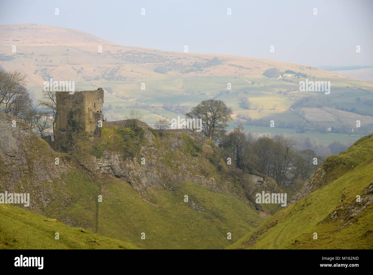 Peveril Castle, a ruined 11th-century castle overlooking the village of Castleton in the English county of Derbyshire Stock Photo