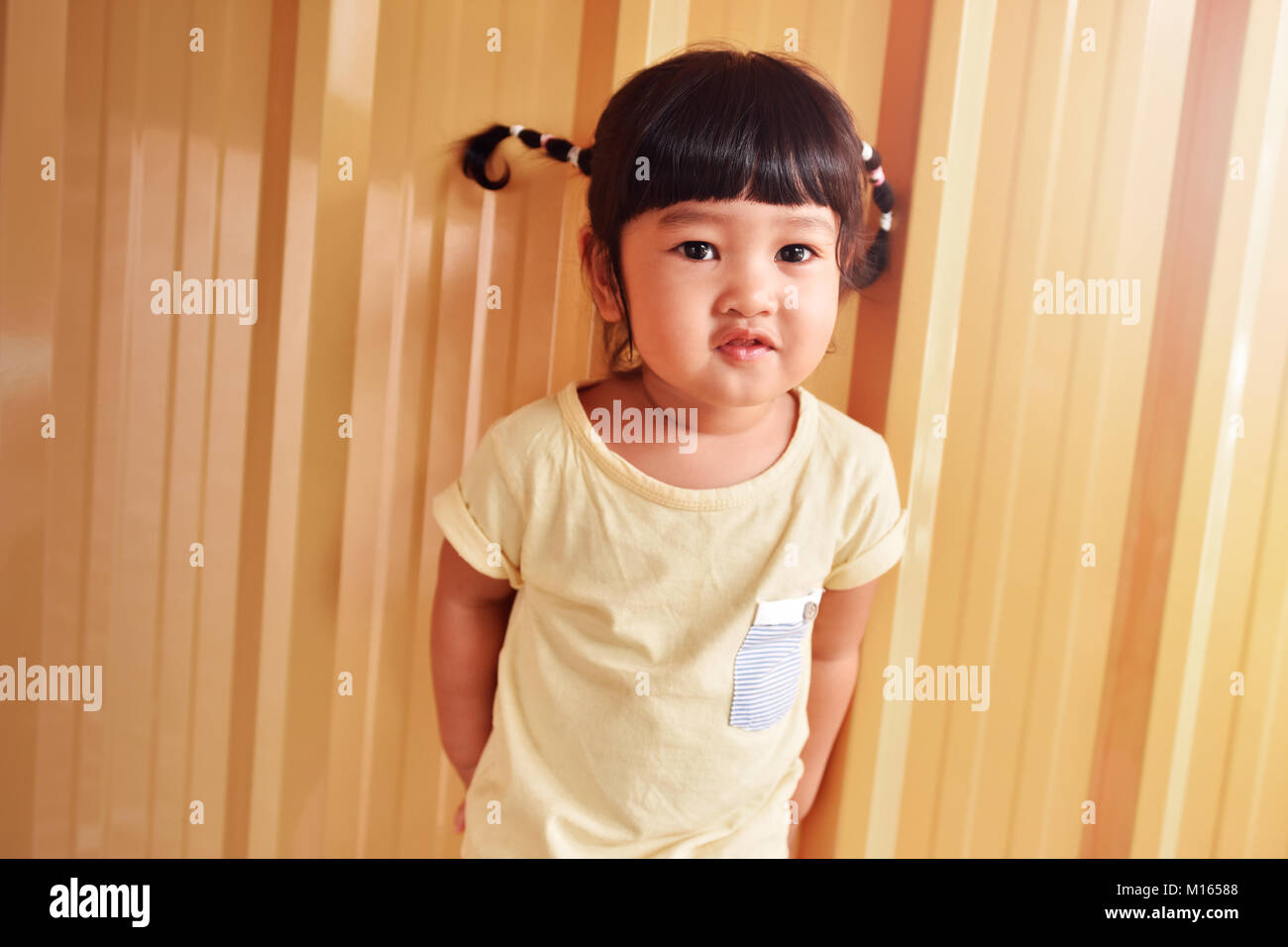 Happy Smart Kids Portrait Asian Girl With A Little Smile On Her