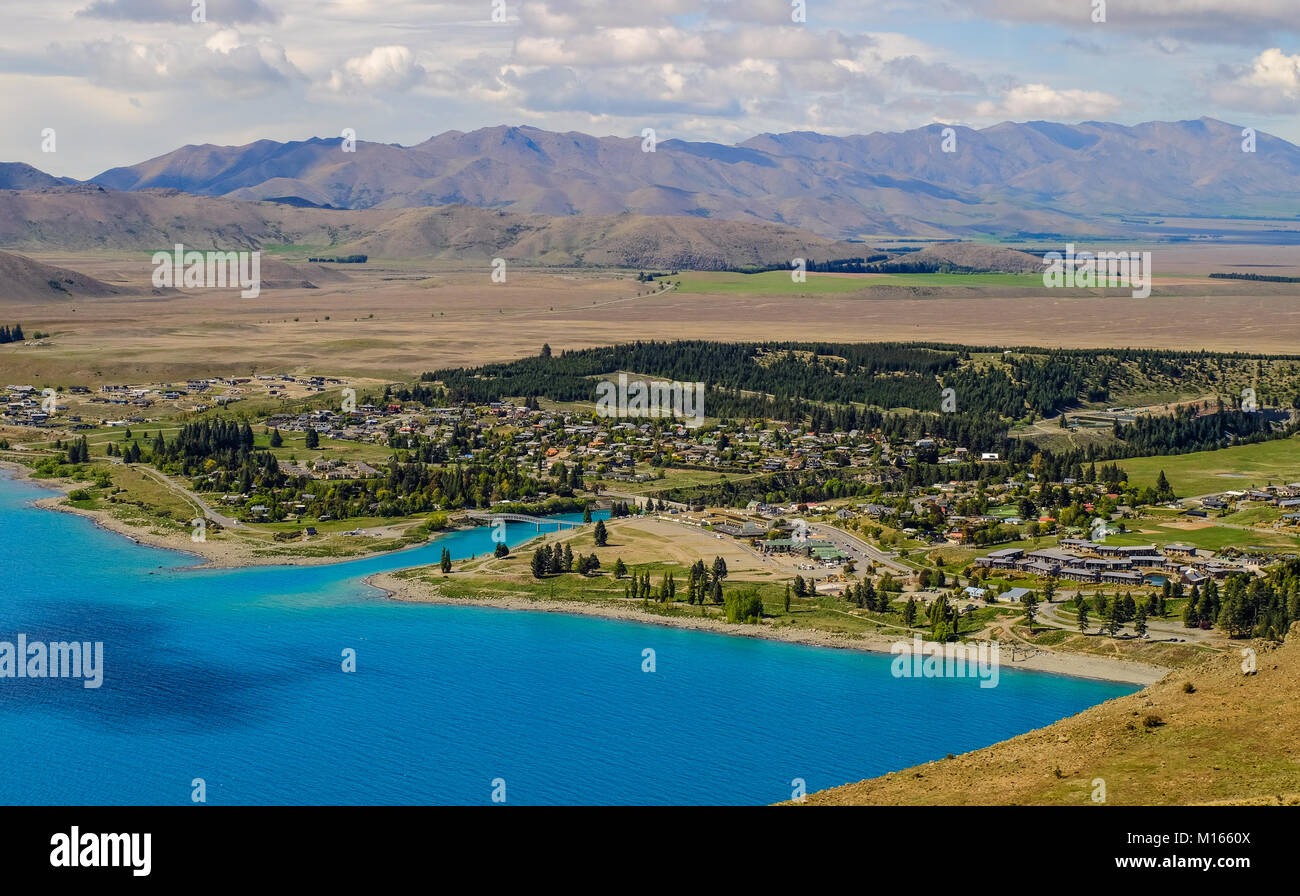 Lake Manapouri with small town in South Island, New Zealand Stock Photo ...