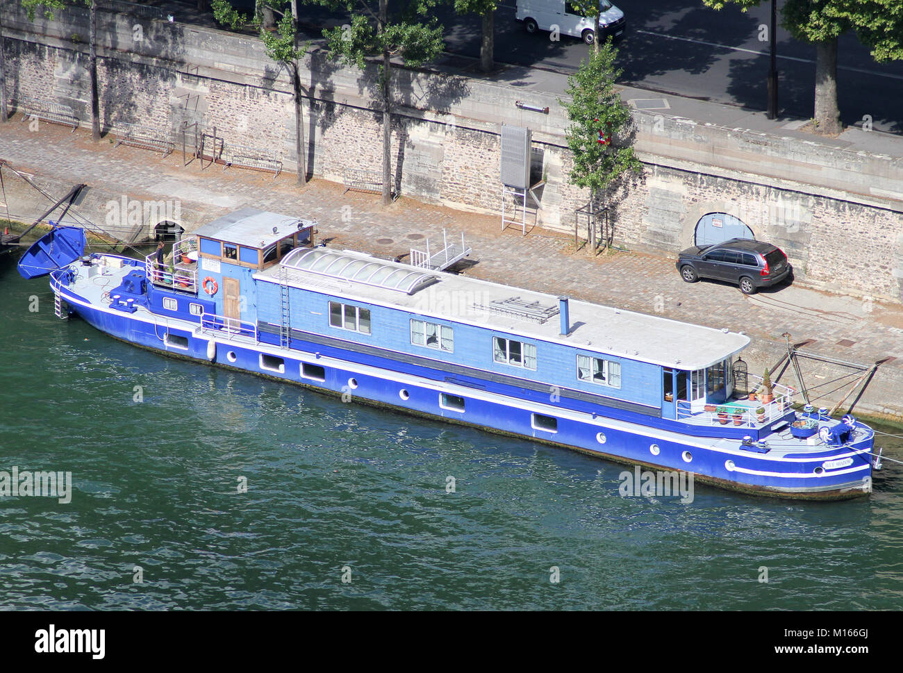 A Blue cruise boat called the Blue Shadow, Seine River, Paris, France. Stock Photo