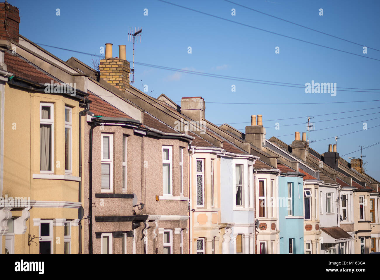 Multicoloured terraced housing in residential area Stock Photo Alamy