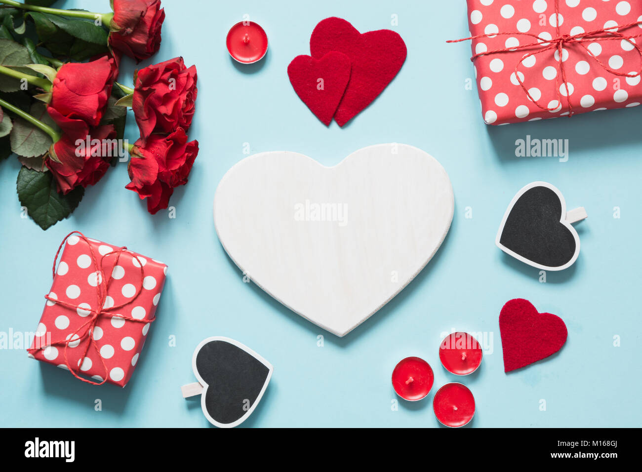 Valentine's day greeting card. Bouquet of red roses and gift, heart as ...