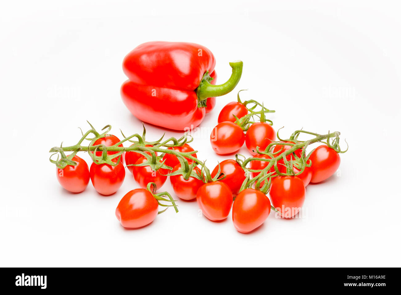 Mini panicles tomatoes with red pepper (Capsicum annuum) Stock Photo