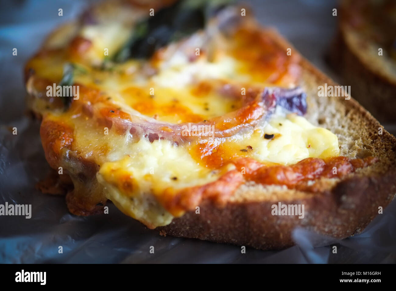 Cheese and onion bruschetta freshly baked Stock Photo