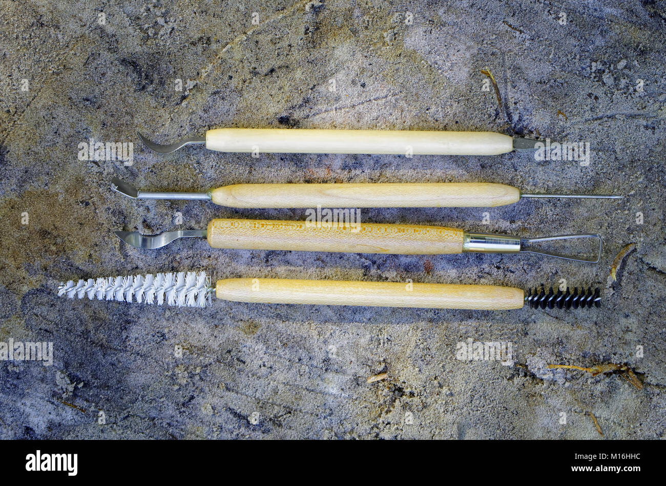 Tools for qualitative cleaning of finds in archeology, paleontology and geology Stock Photo