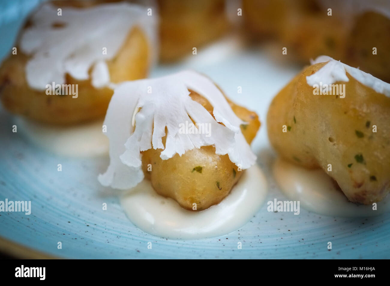 Cauliflower tempura with pickled and pureed cauliflower. Light, modern