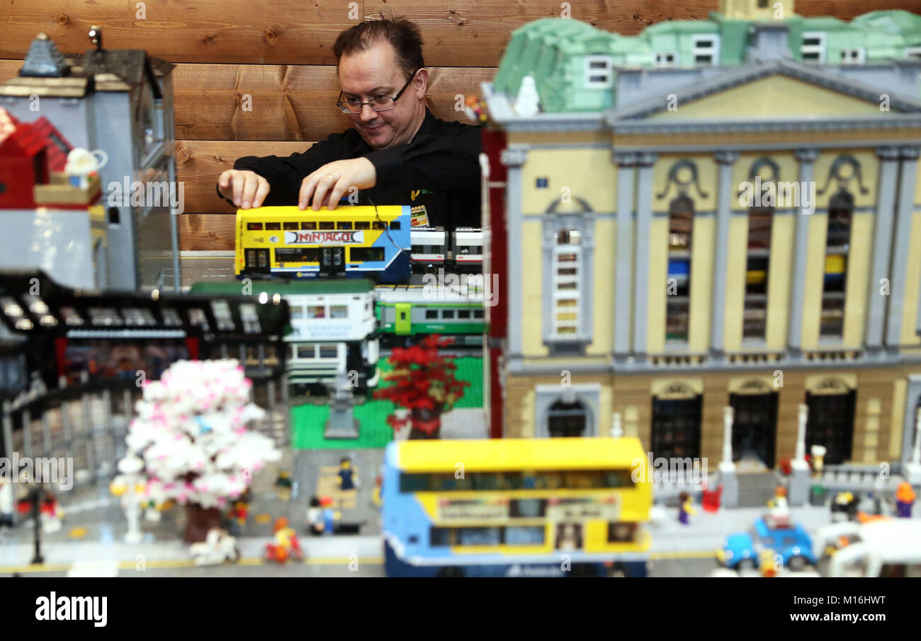 David Fennell adjusts a model Dublin Bus on a Dublin street model, at  Brickxfest an event for Lego enthusiasts at Tayto Park, Co. Meath Stock  Photo - Alamy