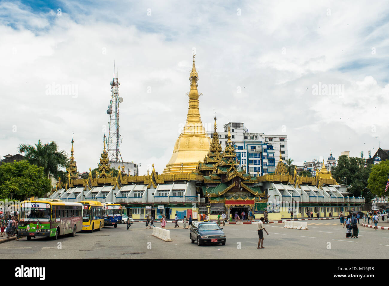 Exterior of Sule Pagoda and golden stupa, at a crossroad and used as a 