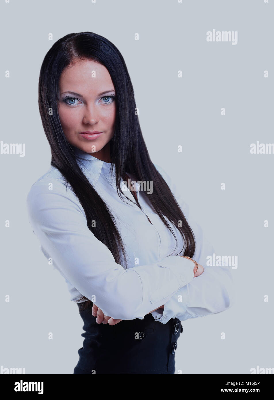 Portrait of a young confident business woman smiling Stock Photo - Alamy