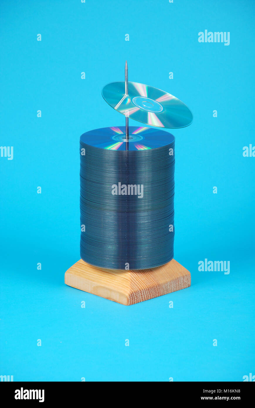disk bulk and CD on blue Stock Photo - Alamy