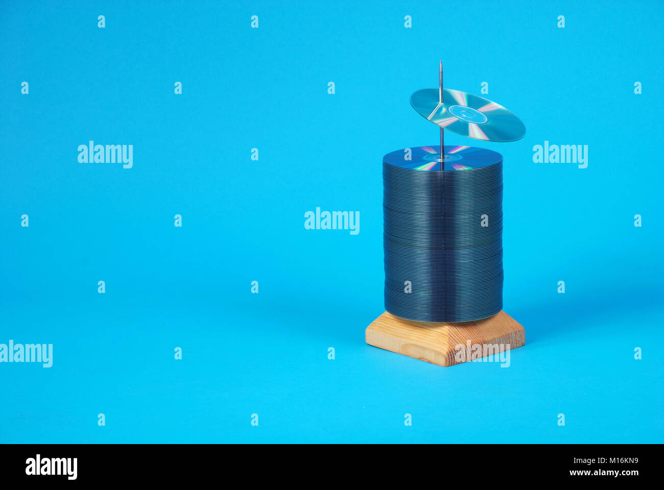 disk bulk and CD on blue Stock Photo - Alamy