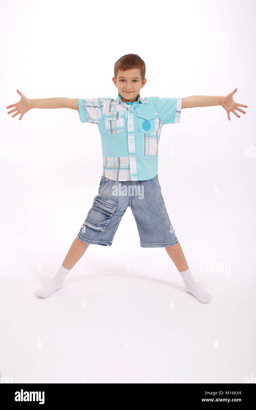 The boy poses, isolated on white background Stock Photo - Alamy
